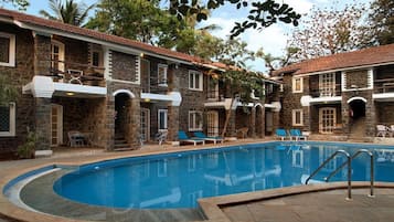 Outdoor pool, open 8 AM to 8 PM, pool umbrellas, sun loungers