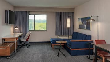 Coffres-forts dans les chambres, bureau, fer et planche à repasser