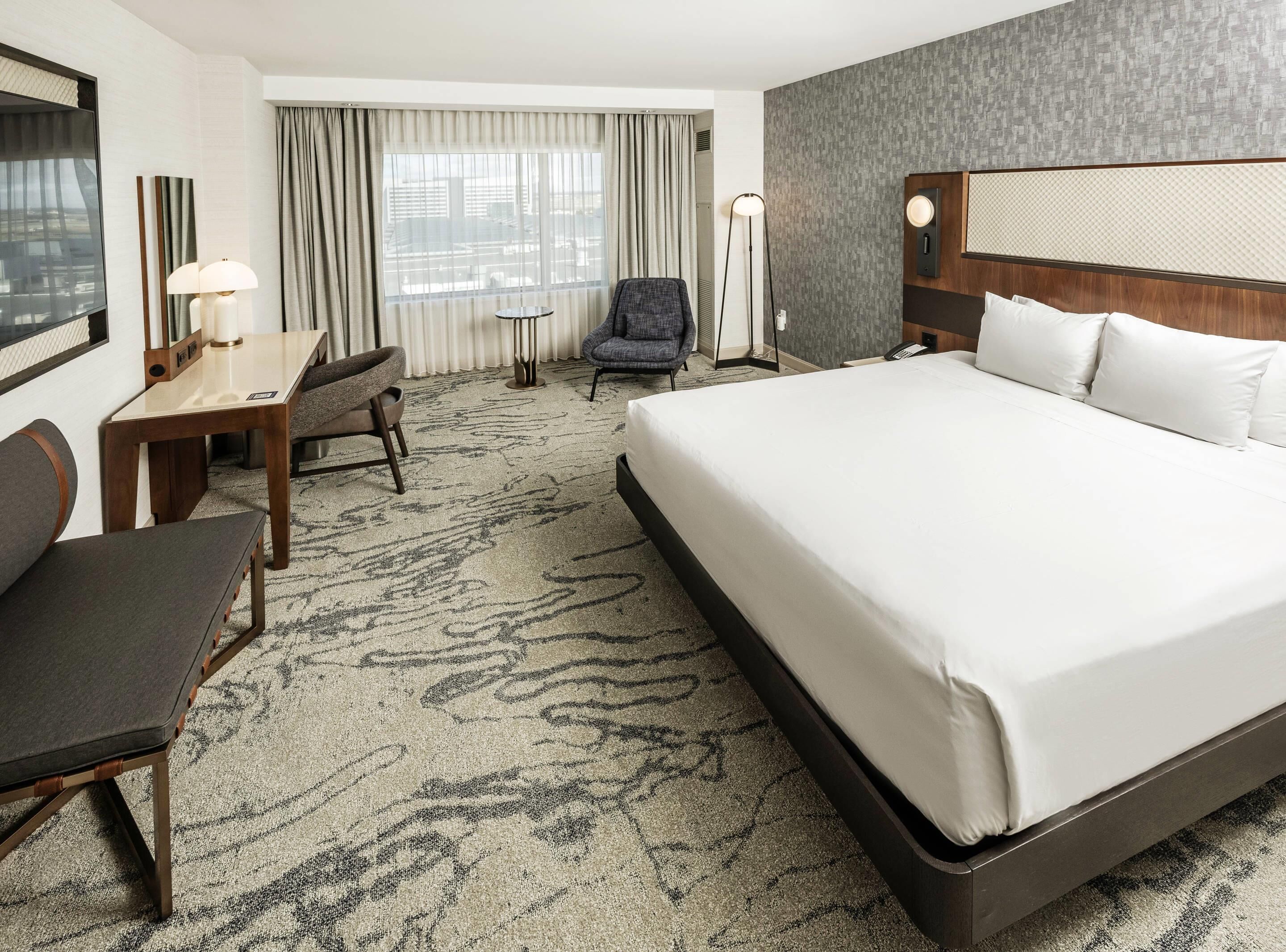 Premium bedding, down duvets, pillow-top beds, in-room safe