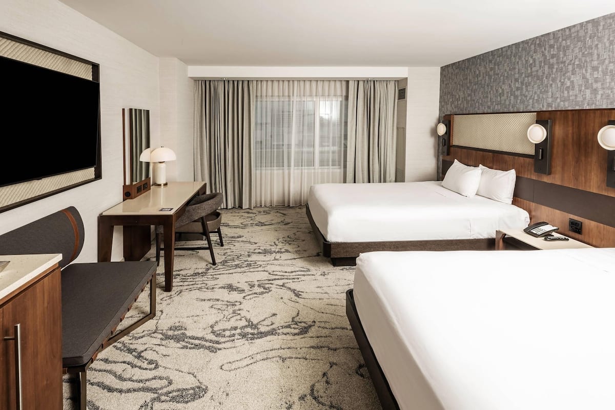 Premium bedding, down duvets, pillow-top beds, in-room safe