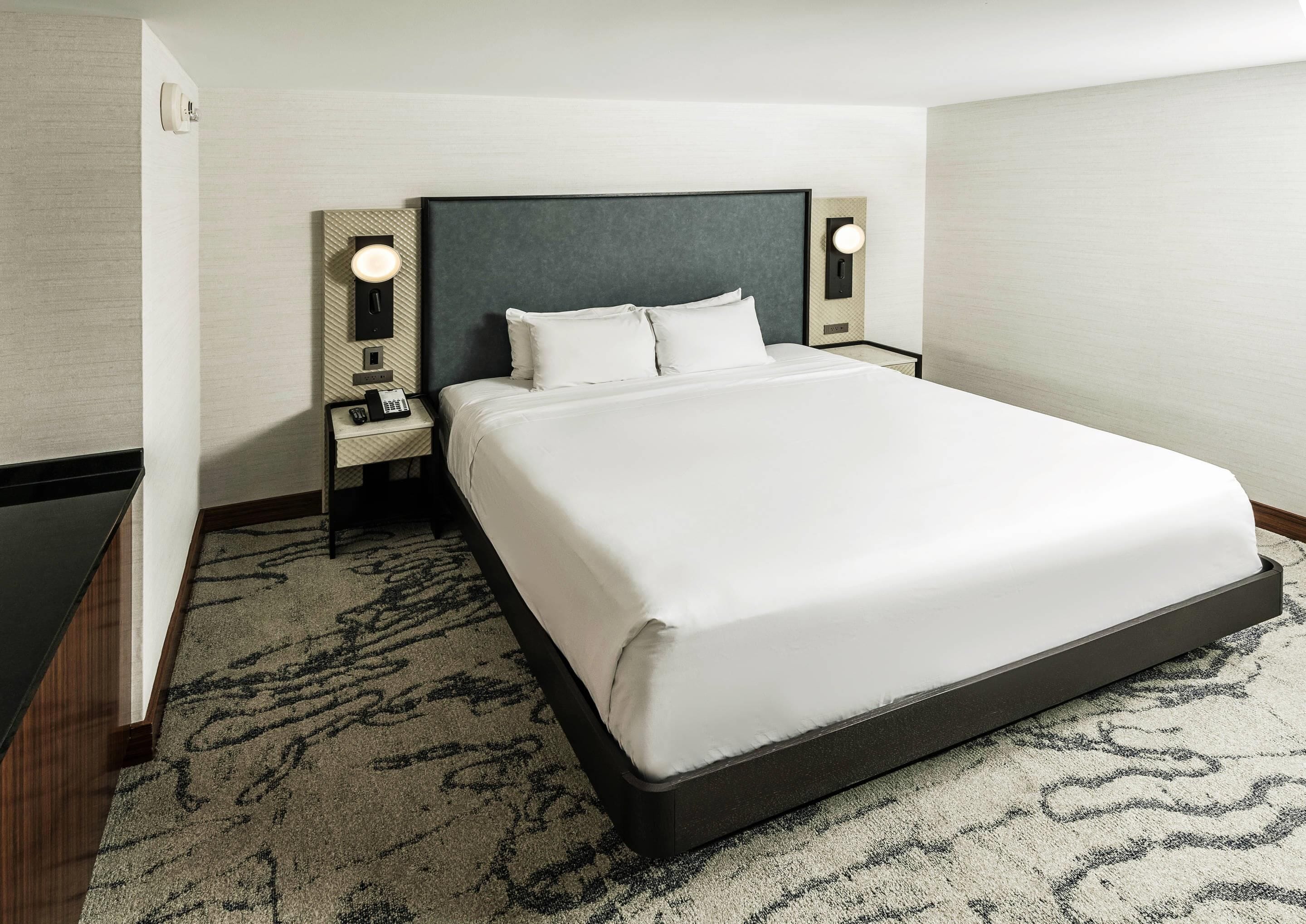 Premium bedding, down duvets, pillow-top beds, in-room safe