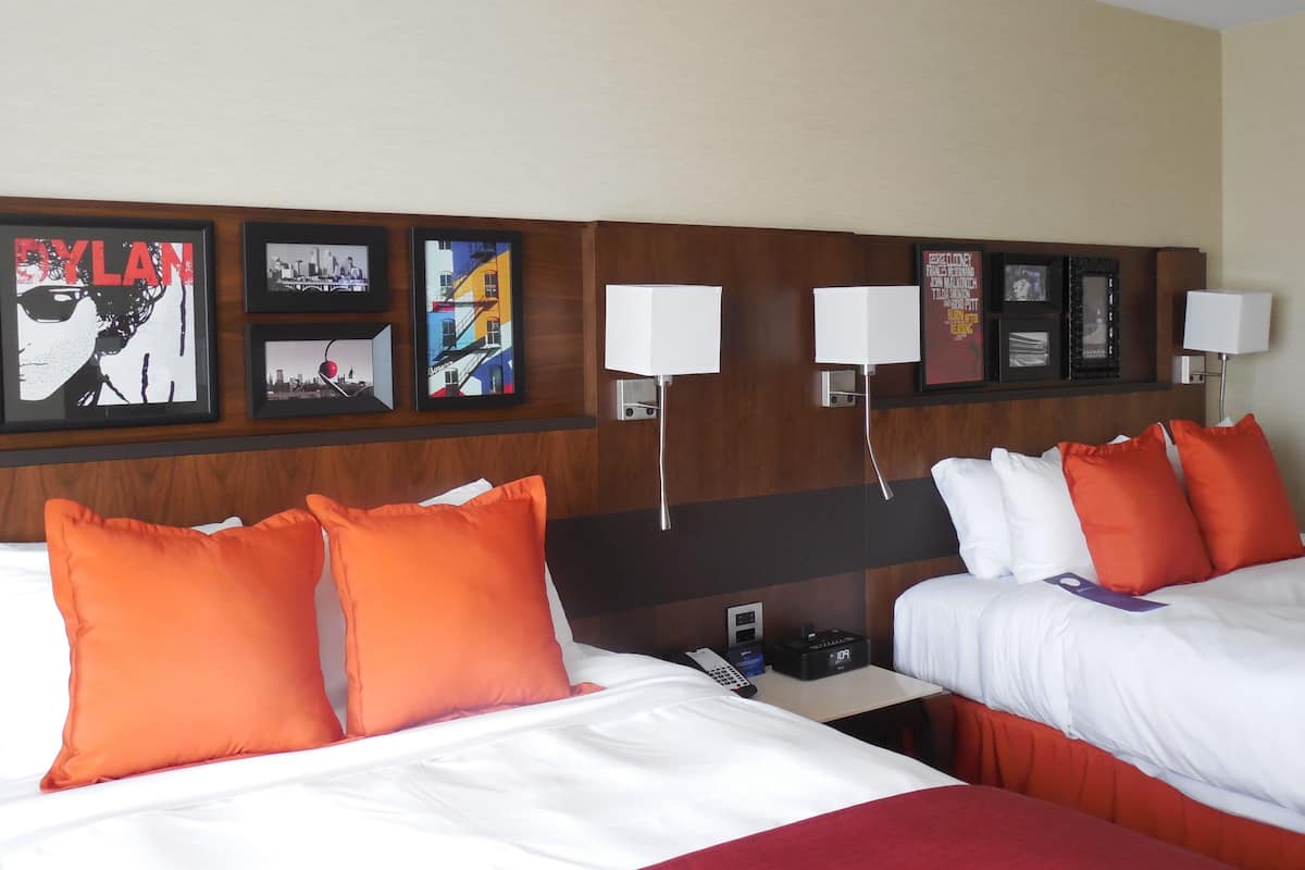 Premium bedding, down duvets, pillow-top beds, in-room safe