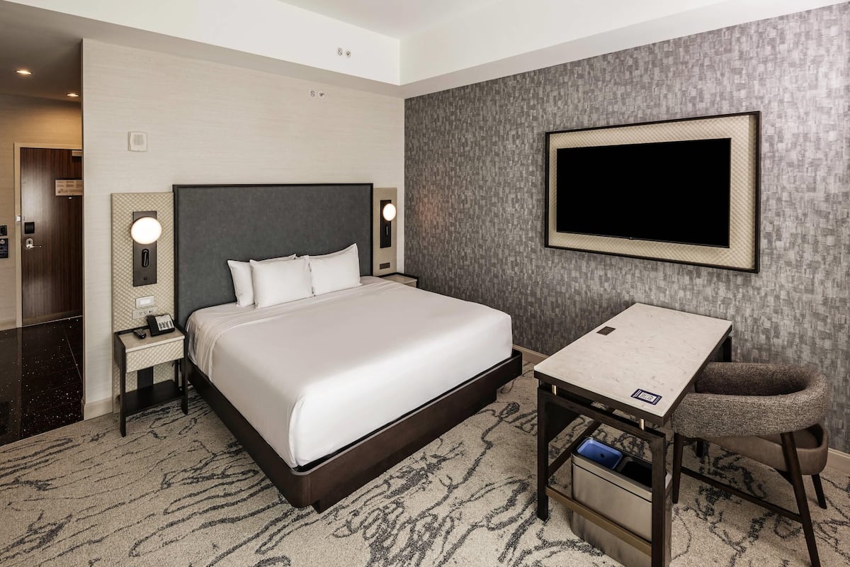 Premium bedding, down duvets, pillow-top beds, in-room safe