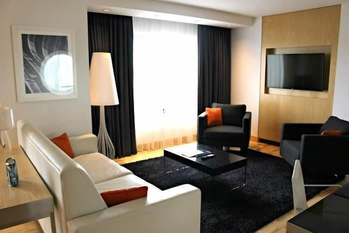 Premium bedding, down comforters, pillowtop beds, in-room safe