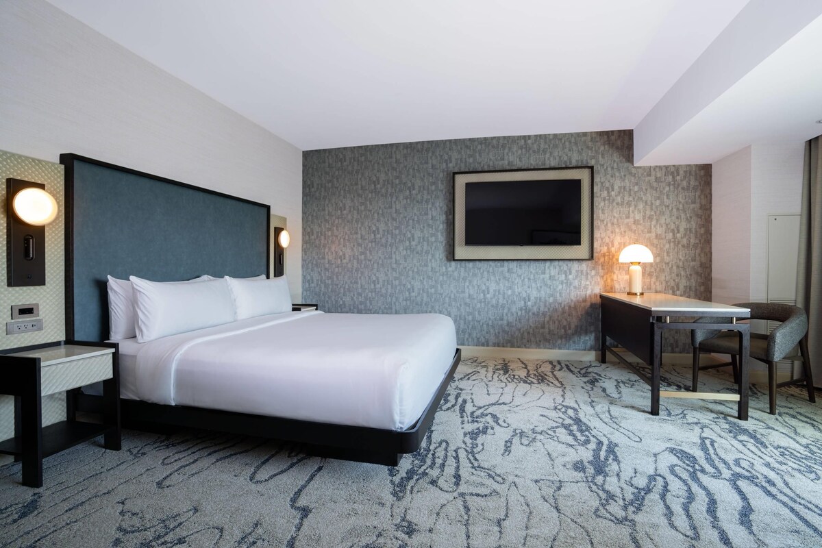 Premium bedding, down comforters, pillowtop beds, in-room safe
