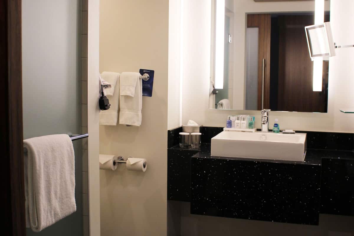 rainfall showerhead, designer toiletries, hair dryer, bathrobes