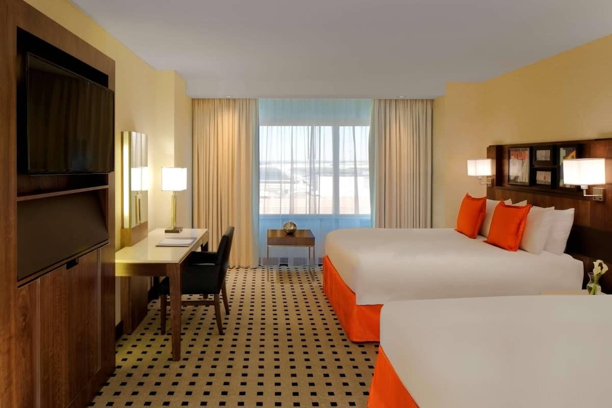 Premium bedding, down comforters, pillowtop beds, in-room safe