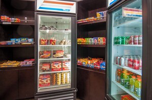 A vending machine stocked with snacks and beverages. - Holiday Inn Express Hotel & Suites Natchez South by IHG (Natchez)