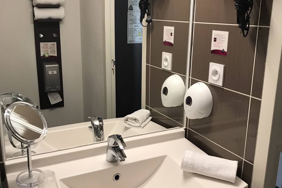 shower, eco-friendly toiletries, hair dryer, towels