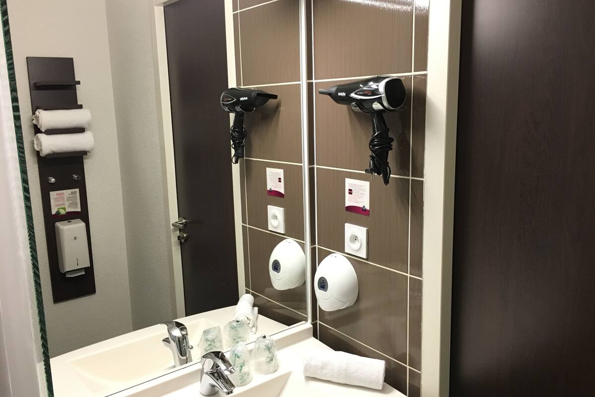 shower, eco-friendly toiletries, hair dryer, towels