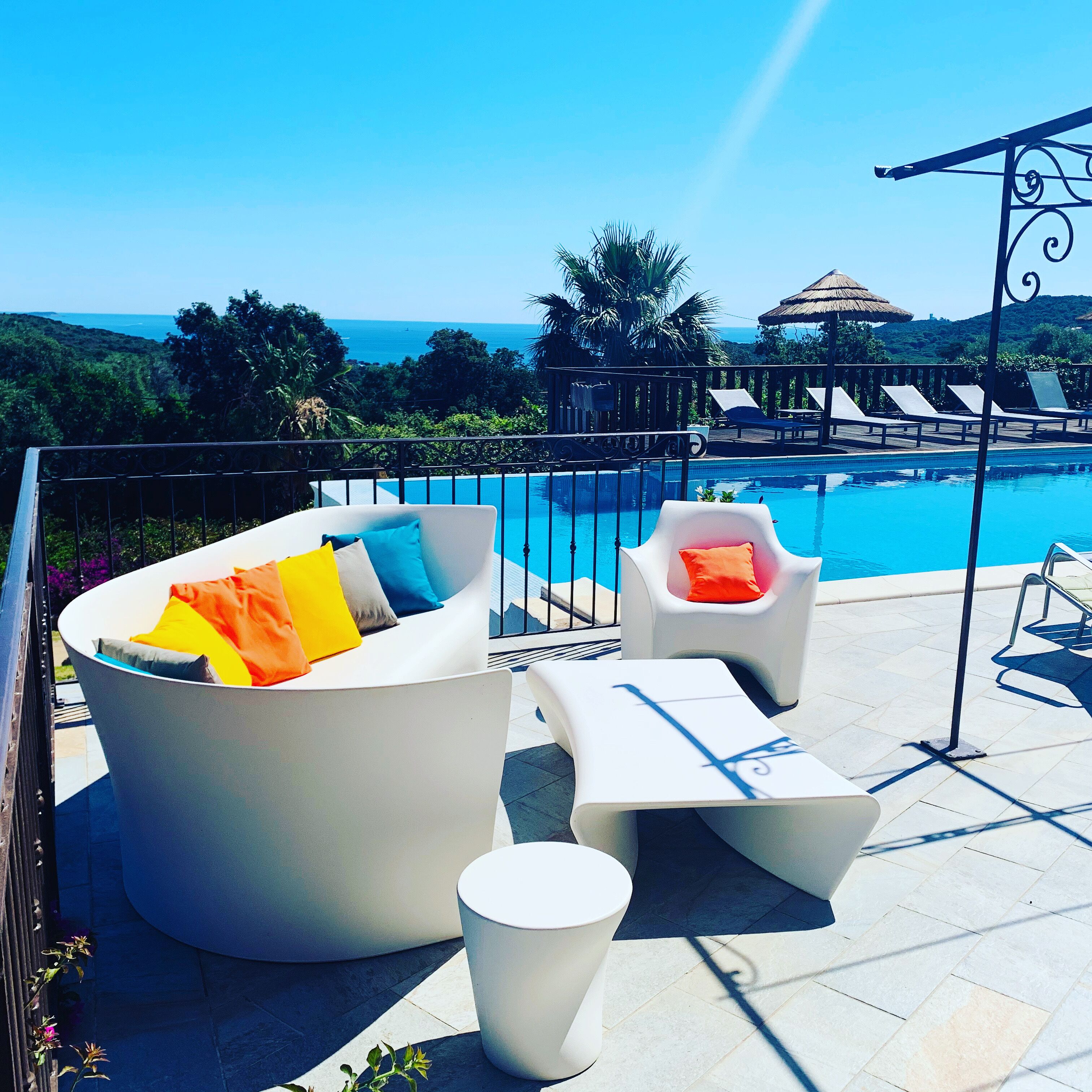 Outdoor pool, pool umbrellas, sun loungers