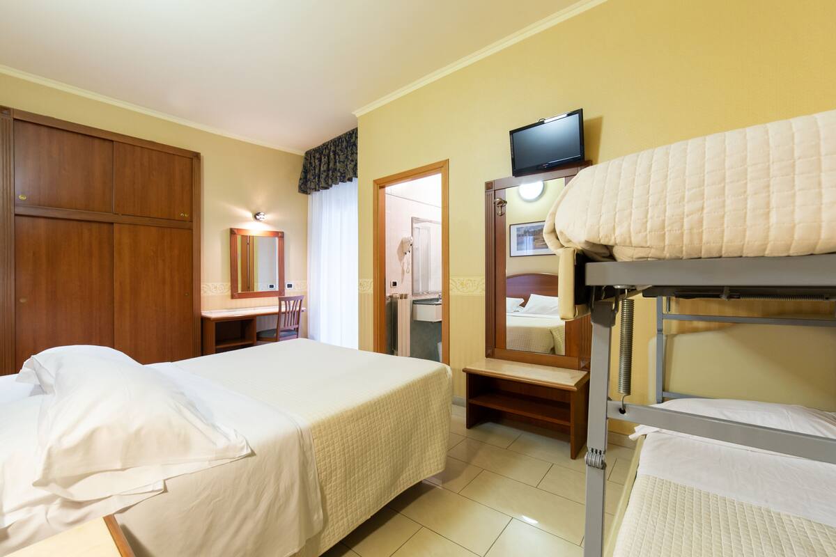 quadruple room | hypo-allergenic bedding, down duvets, in-room safe