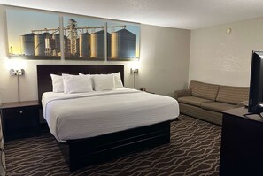Studio Suite, 1 King Bed, Non Smoking | Desk, laptop workspace, blackout curtains, iron/ironing board - Days Inn & Suites by Wyndham Casey (Casey)