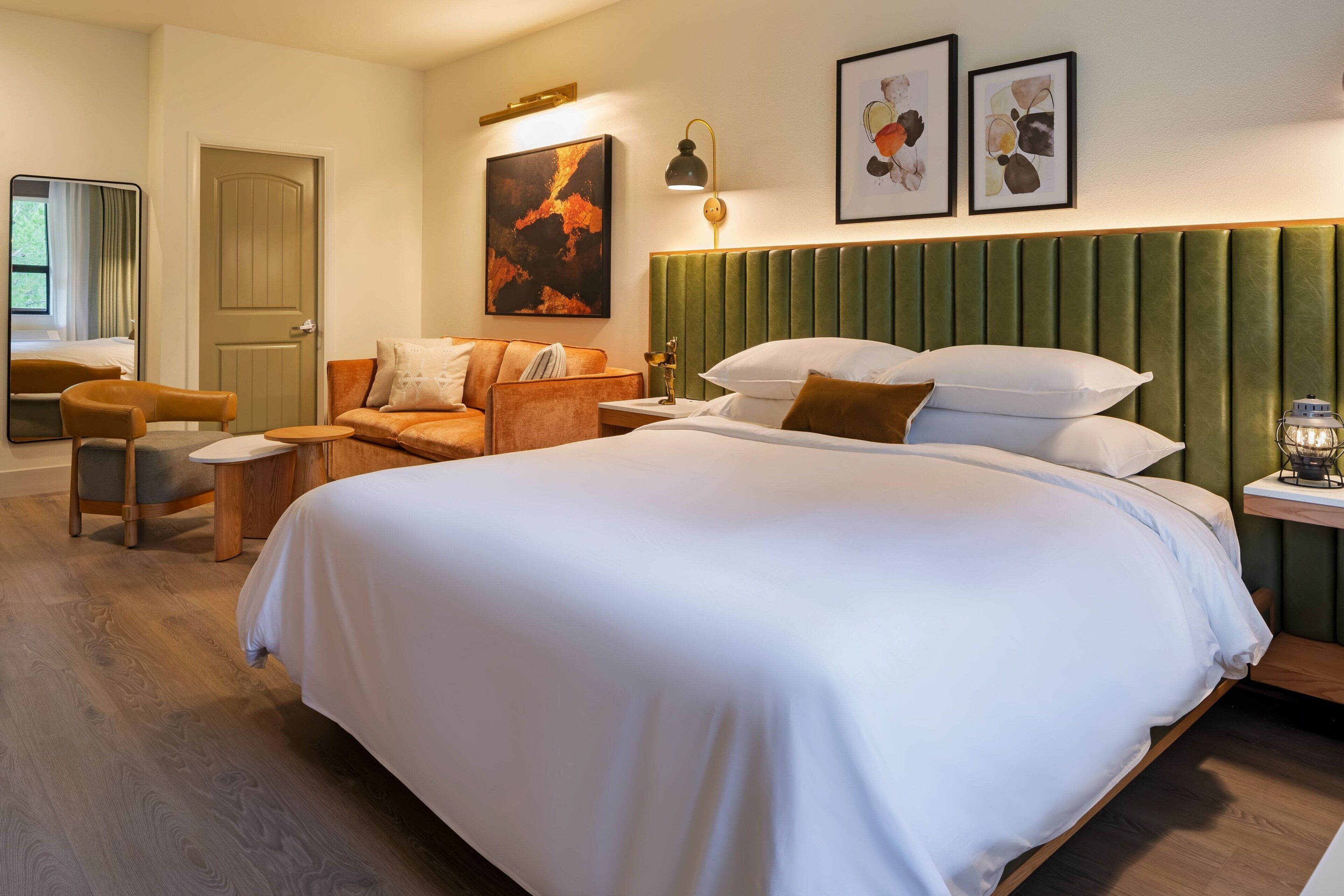 Desk, laptop workspace, iron/ironing board, free cribs/infant beds