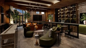 A modern bar area with seating, a TV, and a variety of plants. - Red Cliffs Lodge Zion, A Tribute Portfolio Hotel - Marriott Bonvoy (Springdale)