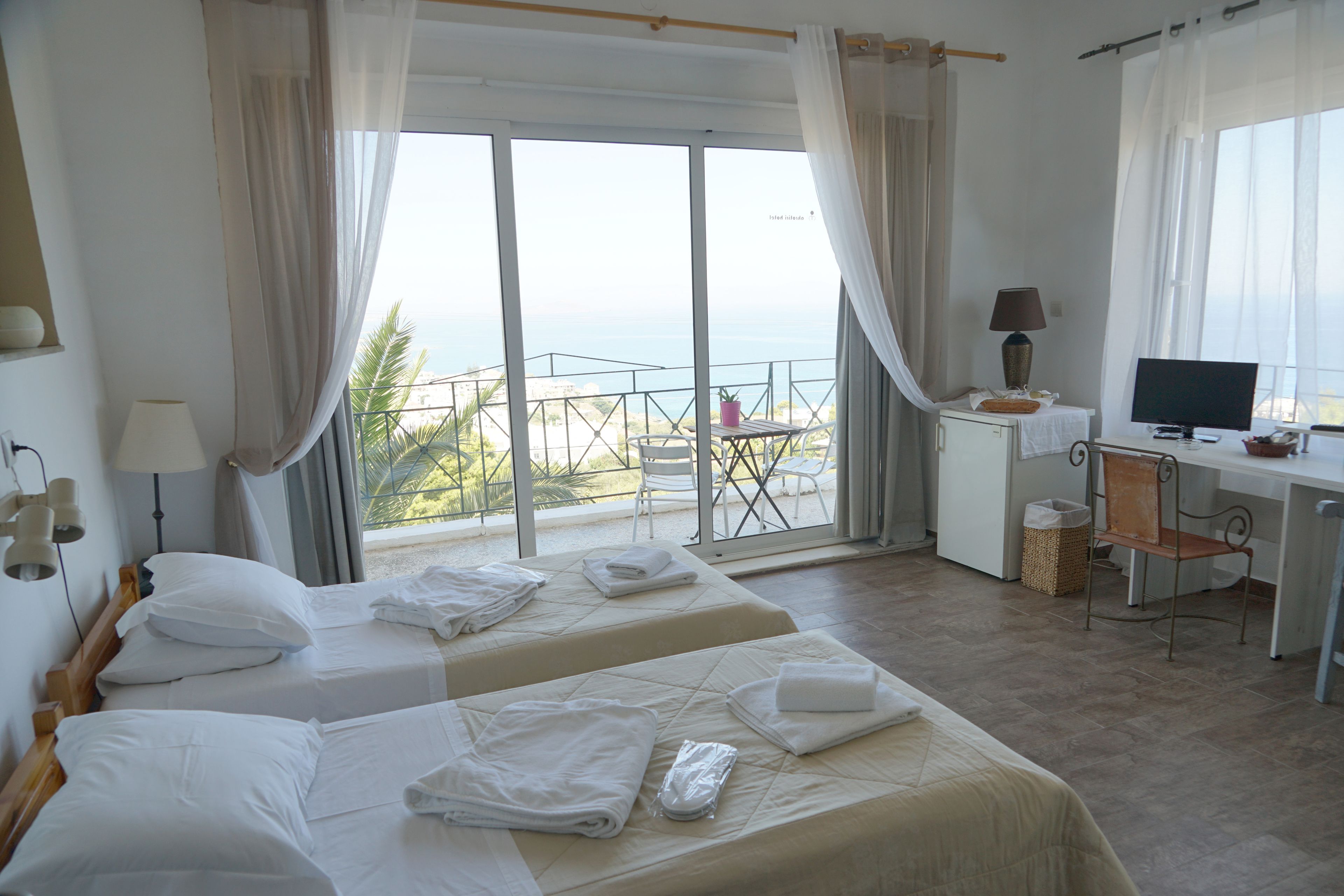 panoramic double or twin room, 1 bedroom, city view, oceanfront | 1 bedroom, egyptian cotton sheets, premium bedding, minibar