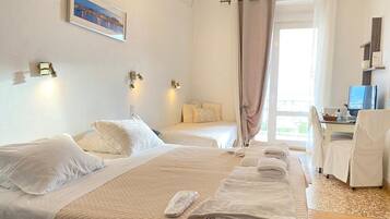 Dreibettzimmer | 1 Schlafzimmer, BettwÀsche aus Àgyptischer Baumwolle