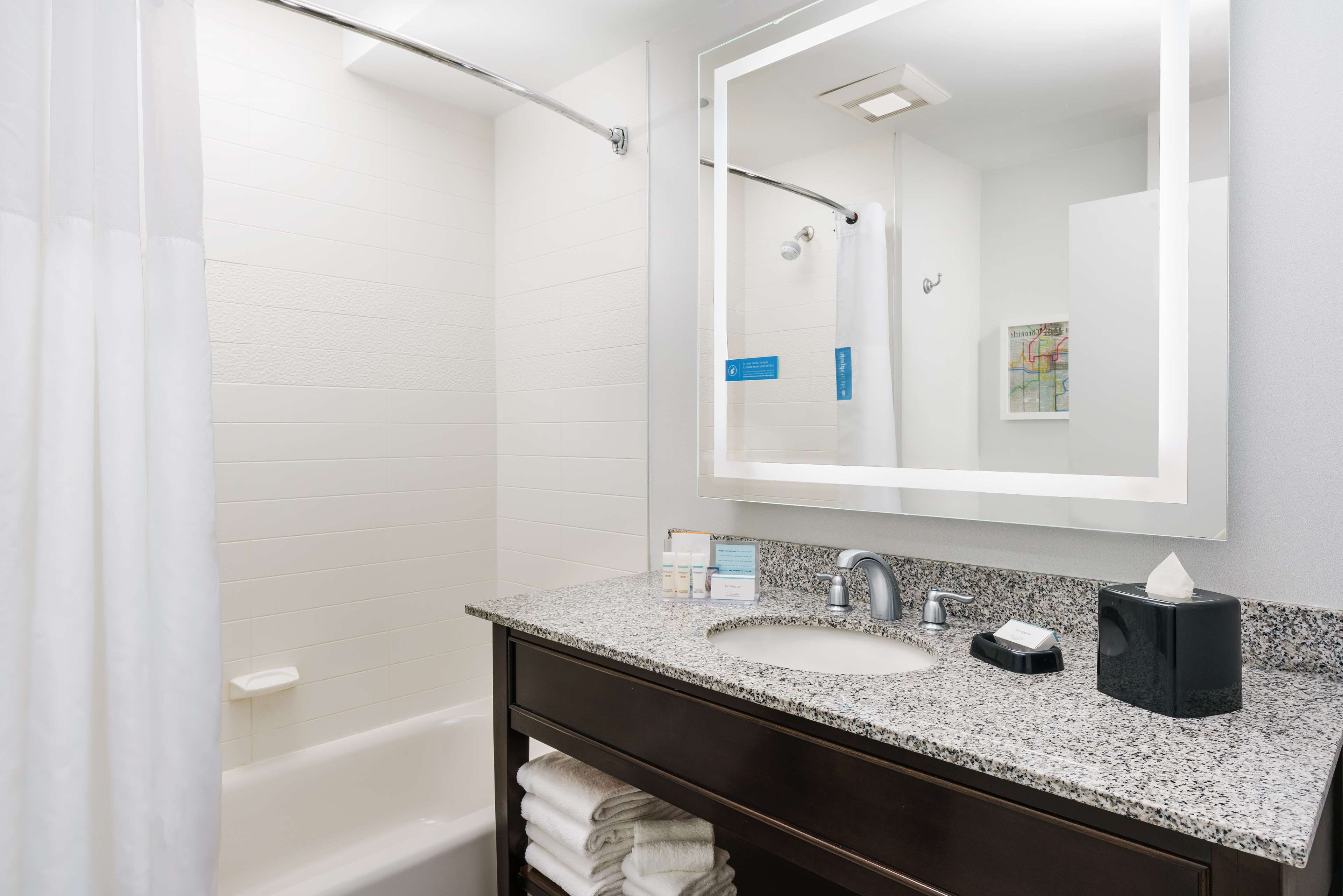 combined shower/bathtub, eco-friendly toiletries, hair dryer, towels