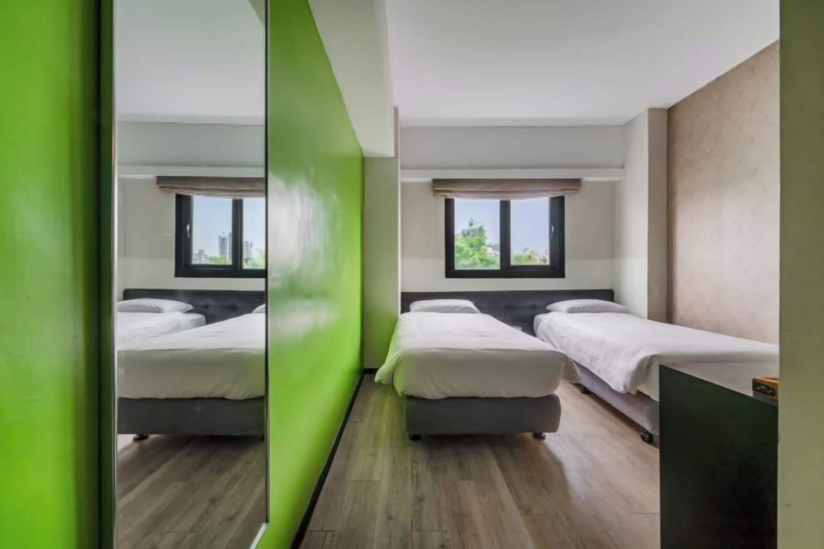 Desk, blackout drapes, soundproofing, free wired internet