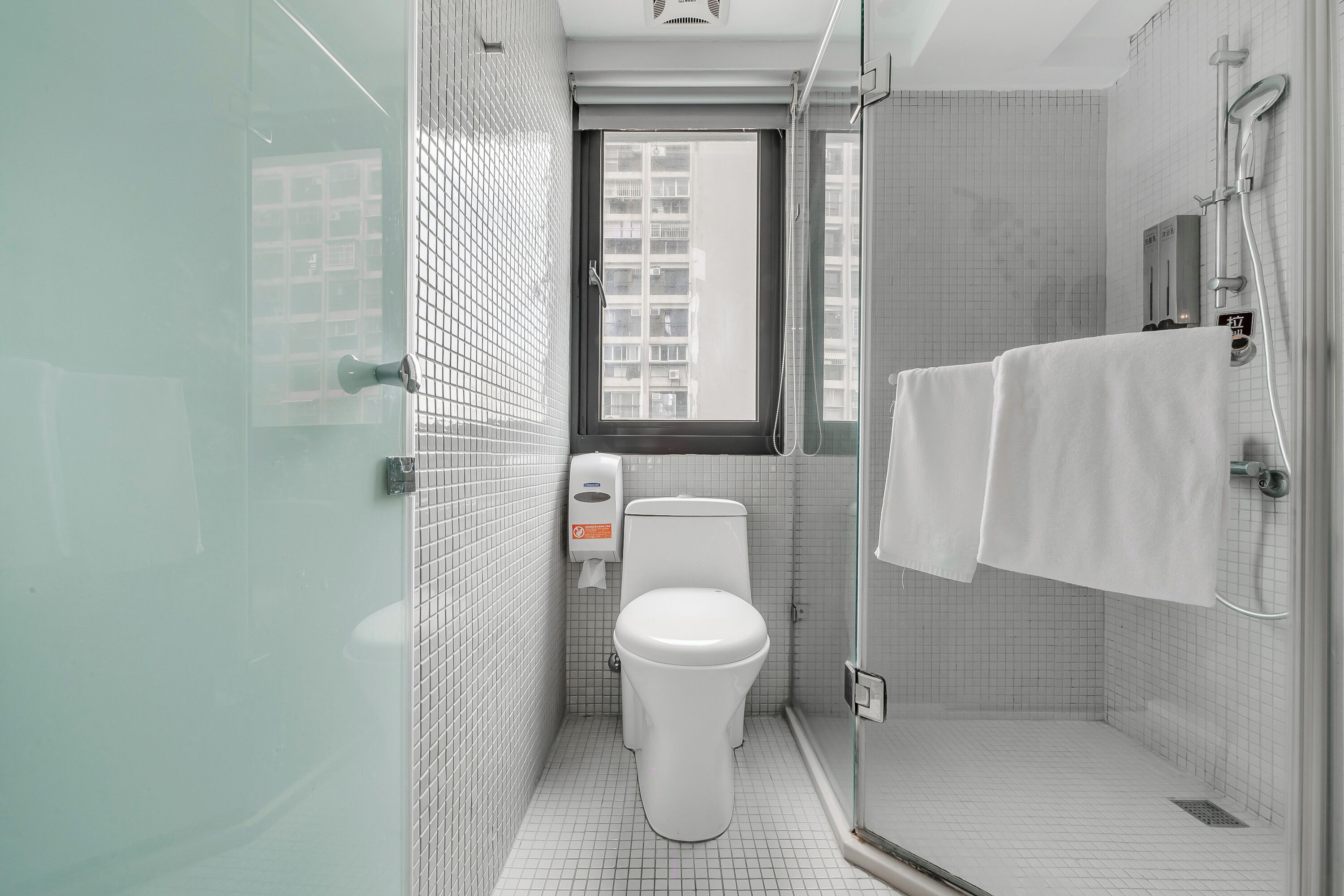 superior quadruple room | bathroom | shower, hair dryer, towels, shampoo