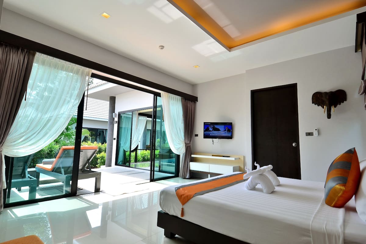 Deluxe Suite Pool Villa | 2 bedrooms, in-room safe, individually decorated, desk