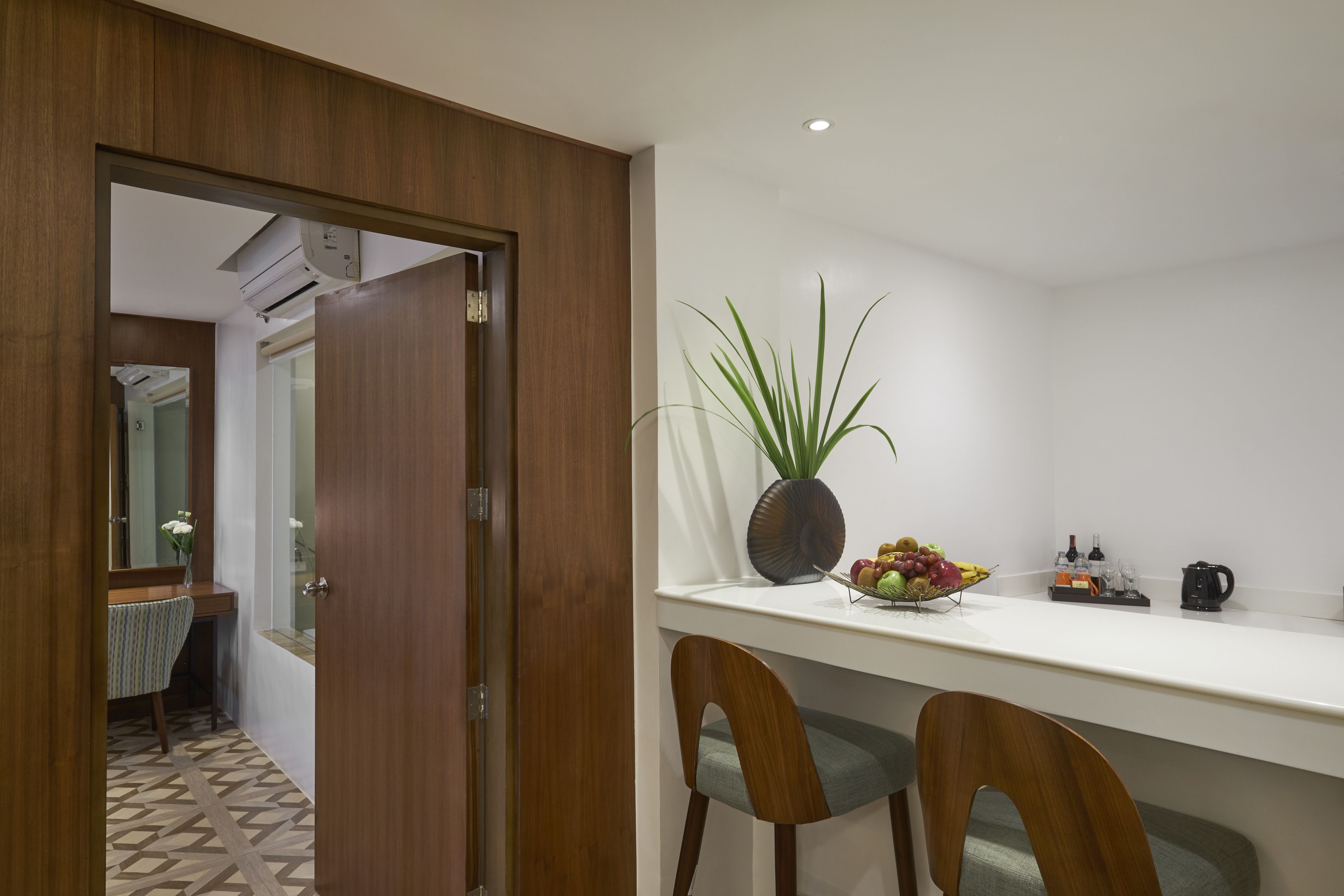 mini-fridge, electric kettle, cookware/dishes/utensils