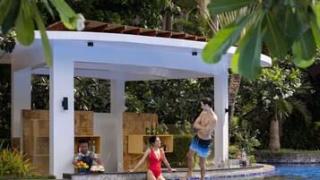 Outdoor pool, open 7 AM to 9 PM, pool loungers