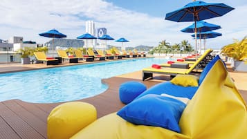 Outdoor pool, open 6:00 AM to 8 PM, pool umbrellas, sun loungers