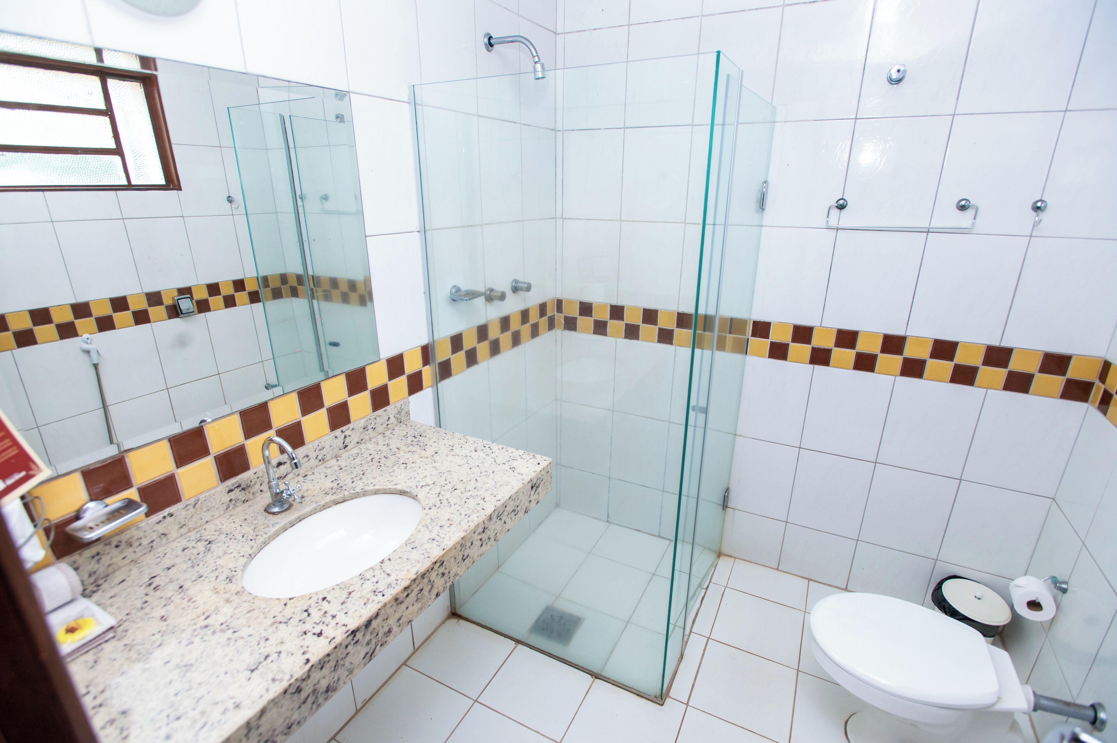 executive triple room | bathroom | shower, hair dryer, bidet, towels