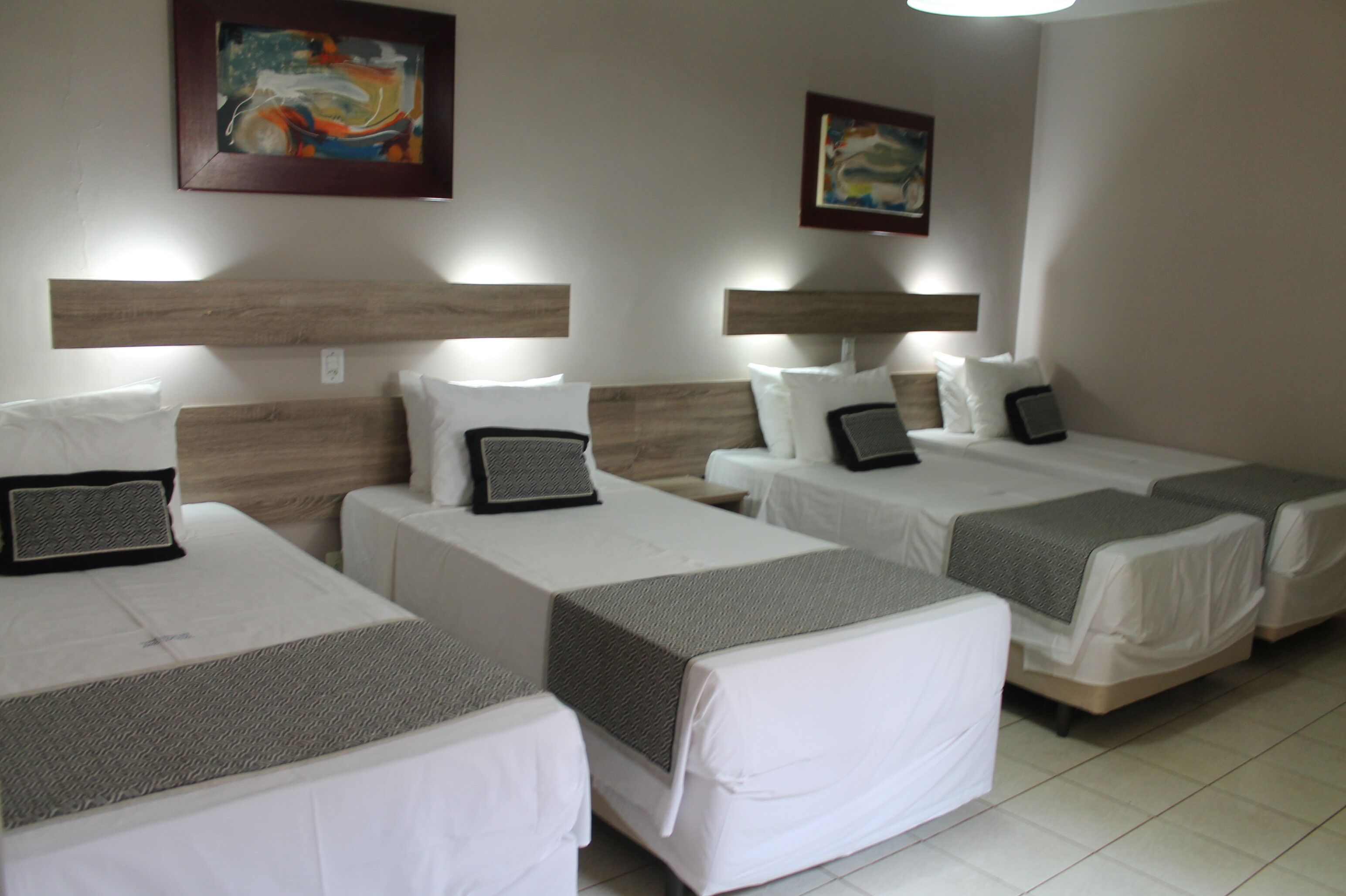 standard quadruple room | minibar, individually decorated, desk, laptop workspace