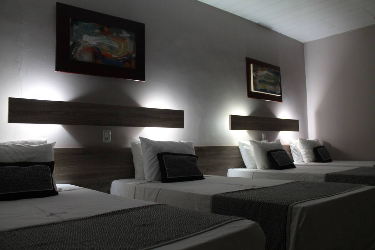 standard quadruple room | minibar, individually decorated, desk, laptop workspace