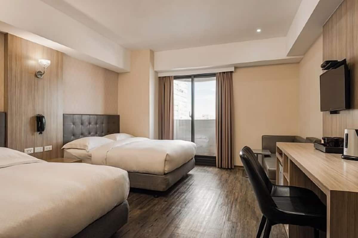 Donzen dekbedden, een minibar, verduisterende gordijnen