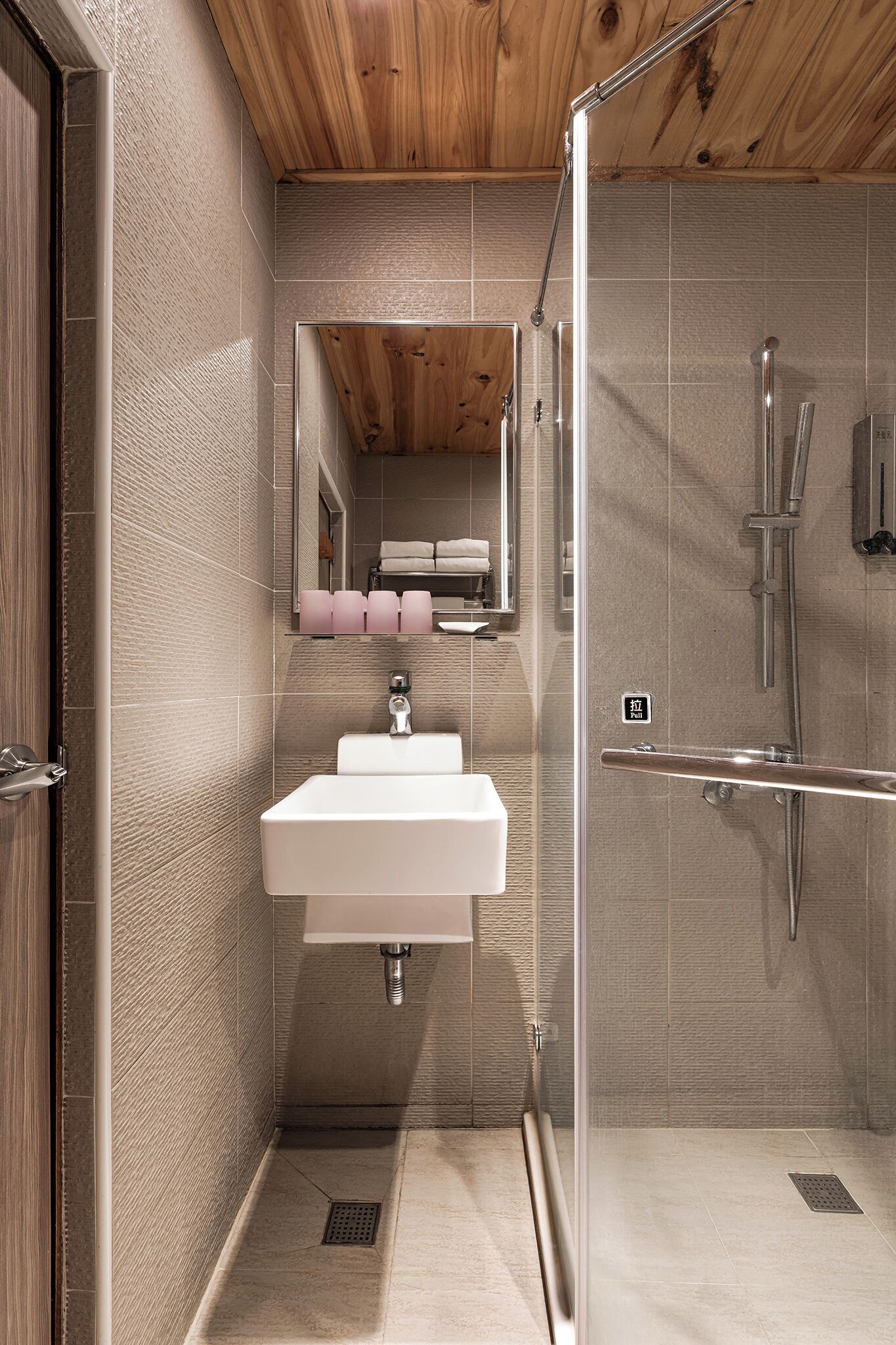 shower, hair dryer, towels, shampoo