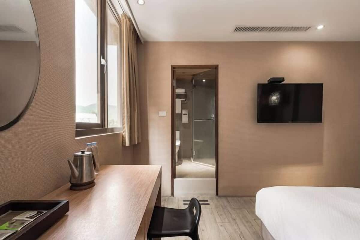 Down comforters, desk, blackout drapes, free WiFi