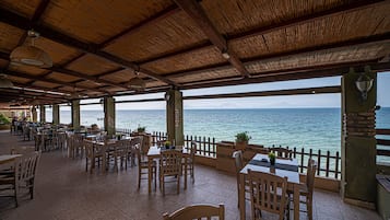 Breakfast, lunch, dinner served; Greek cuisine, beach views