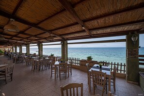 Breakfast, lunch, dinner served; Greek cuisine, beach views