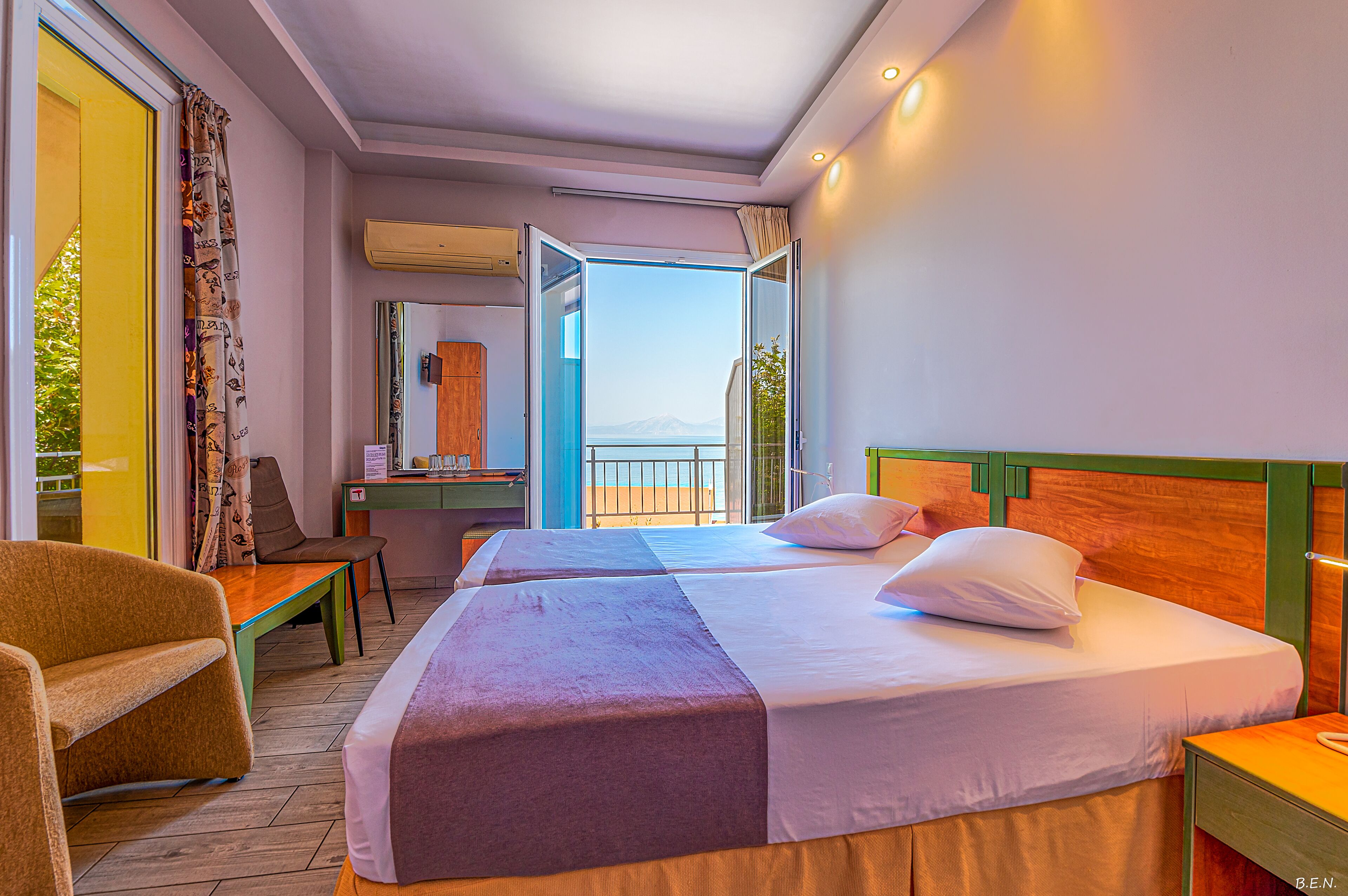 Triple Room, Sea View | Free cribs/infant beds, rollaway beds, free WiFi