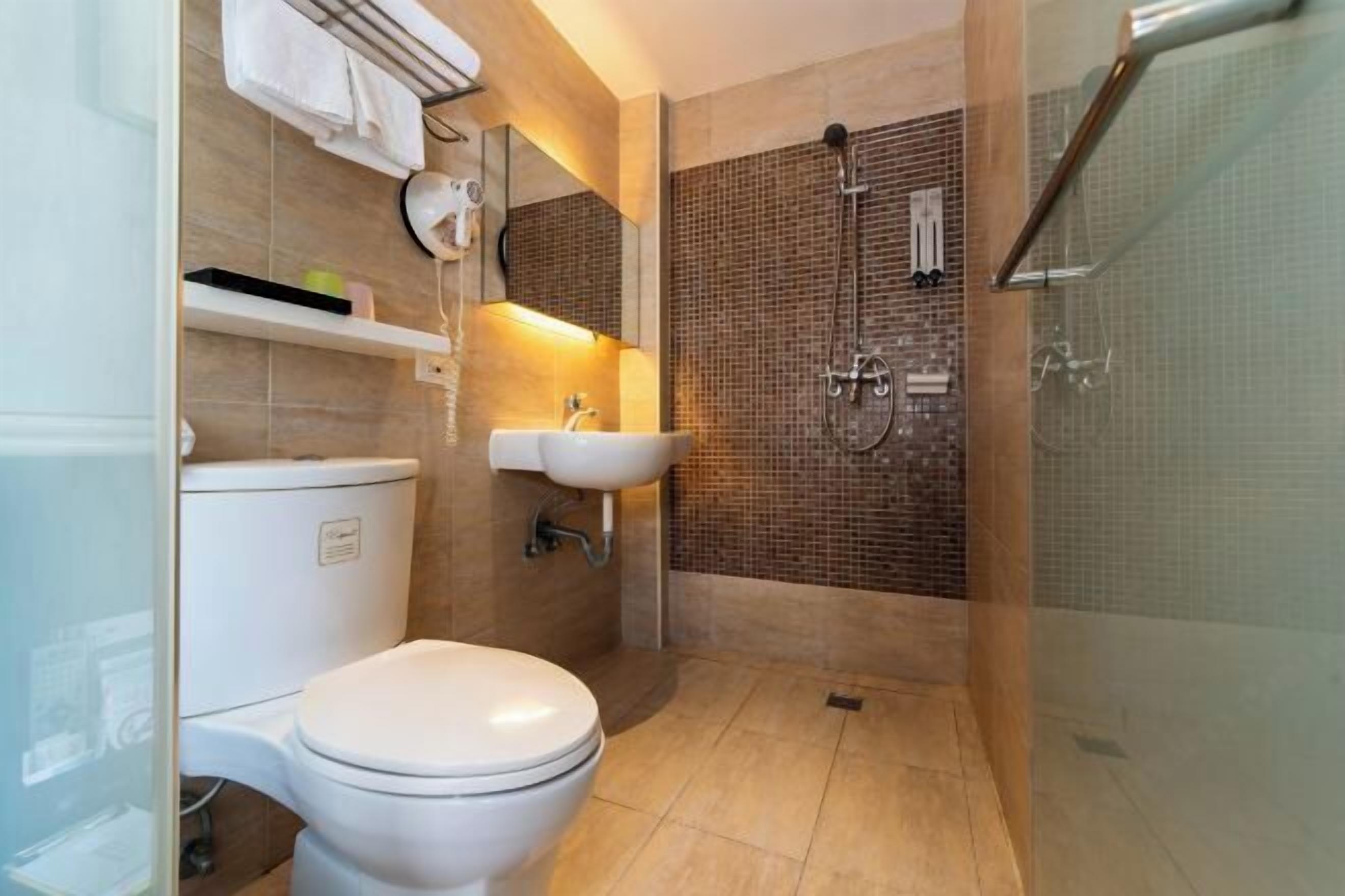 Bathroom | Hair dryer, slippers, towels, soap