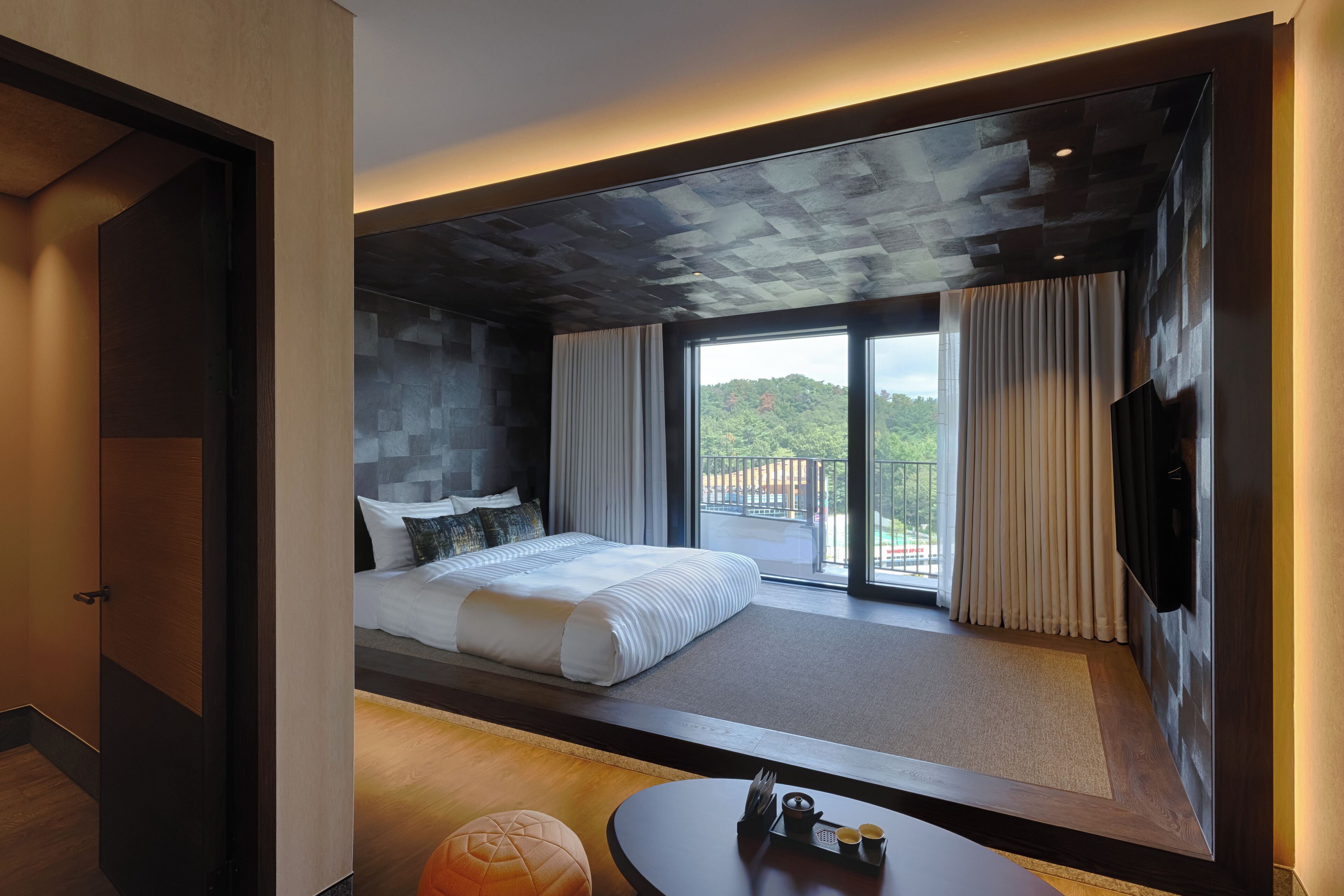 Deluxe suite | Luxe beddengoed, verduisterende gordijnen, geluiddichte muren