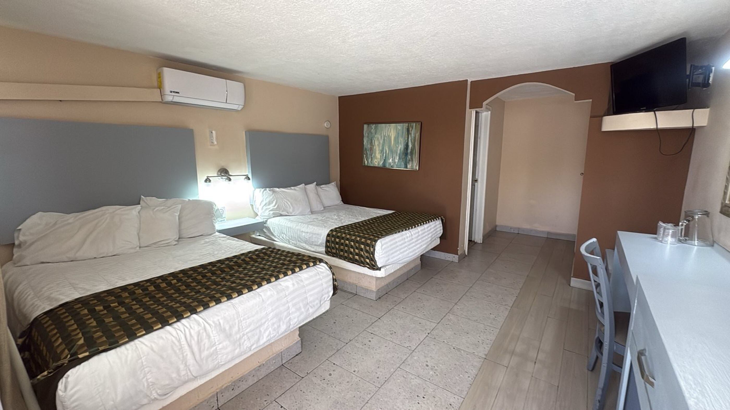 Standard Quadruple Room | Select Comfort beds, individually furnished, iron/ironing board