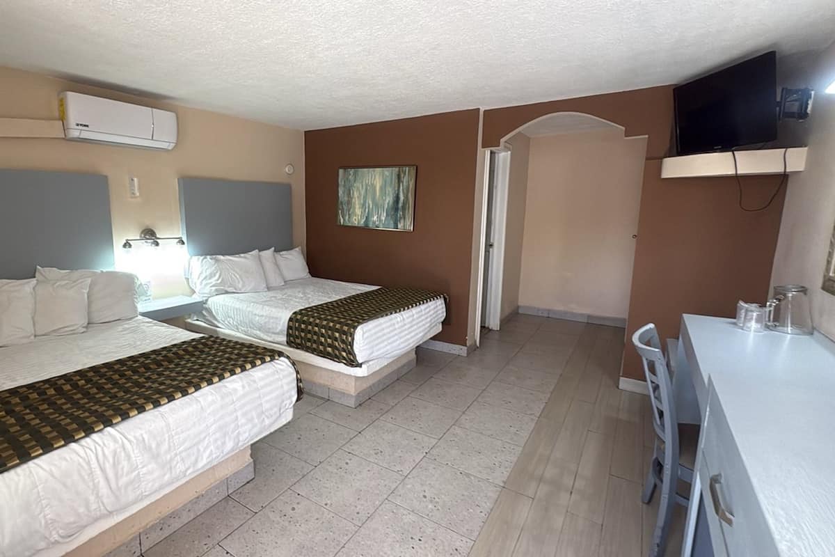 Standard Quadruple Room | Select Comfort beds, individually furnished, iron/ironing board