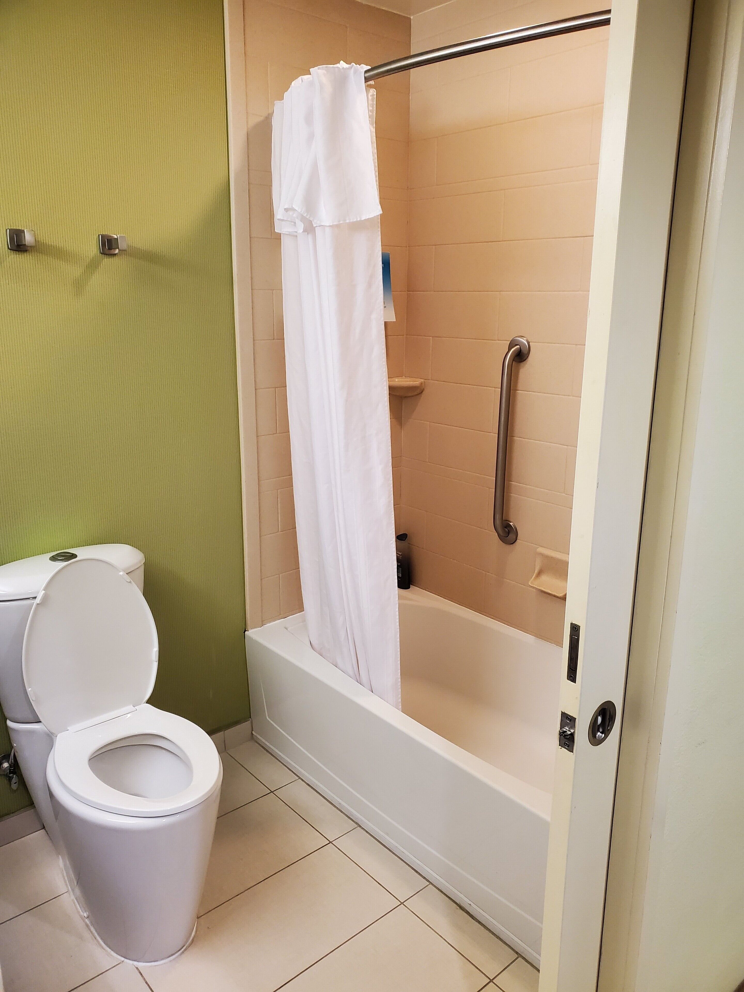 studio, 2 queen beds | bathroom | free toiletries, hair dryer, towels, soap