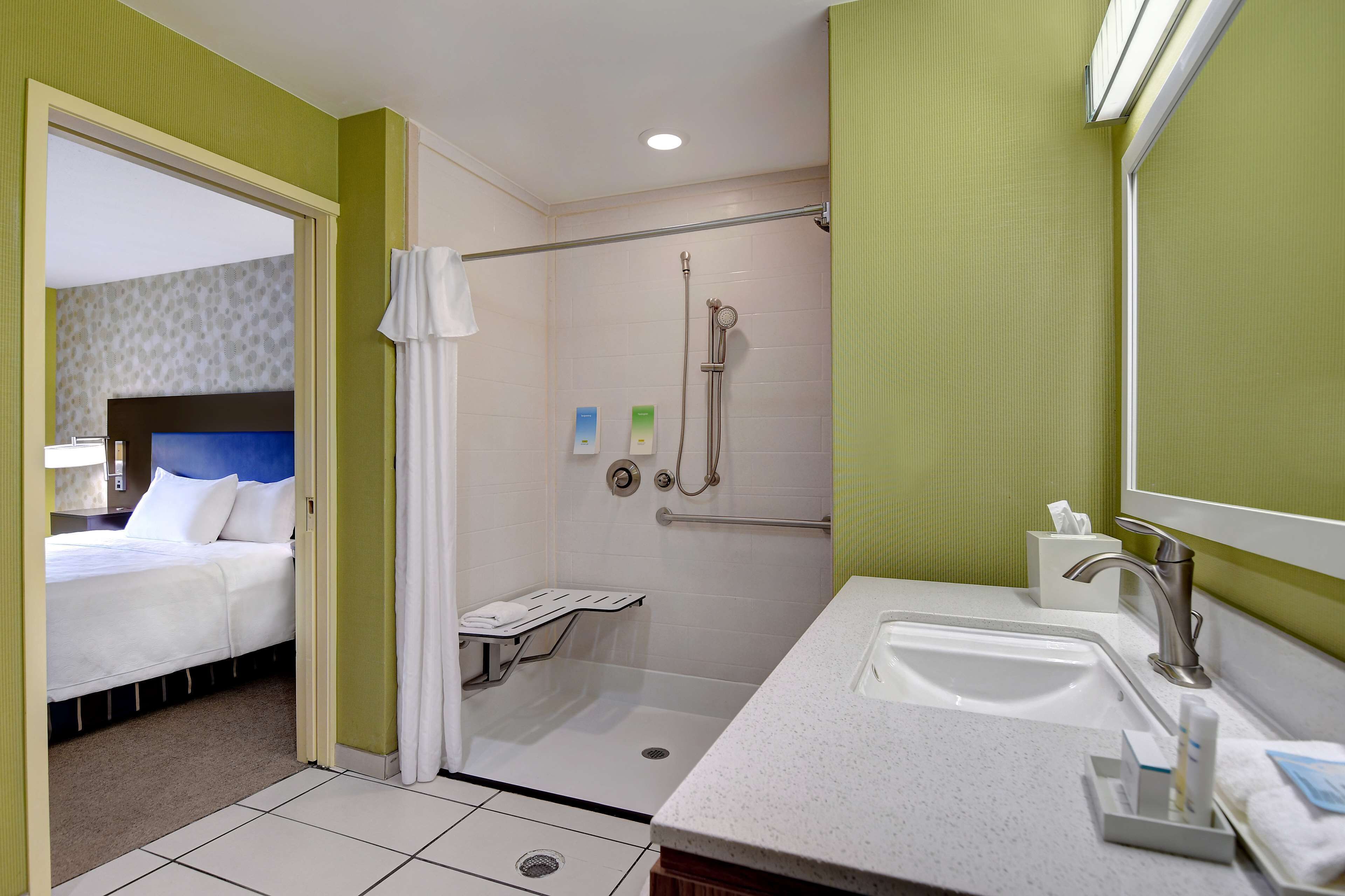 suite, 1 king bed, accessible (roll-in shower) | bathroom shower
