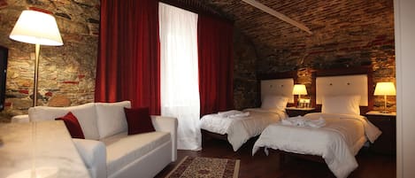 Premium bedding, desk, laptop workspace, blackout curtains