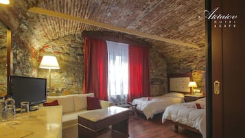 Premium bedding, desk, laptop workspace, blackout drapes