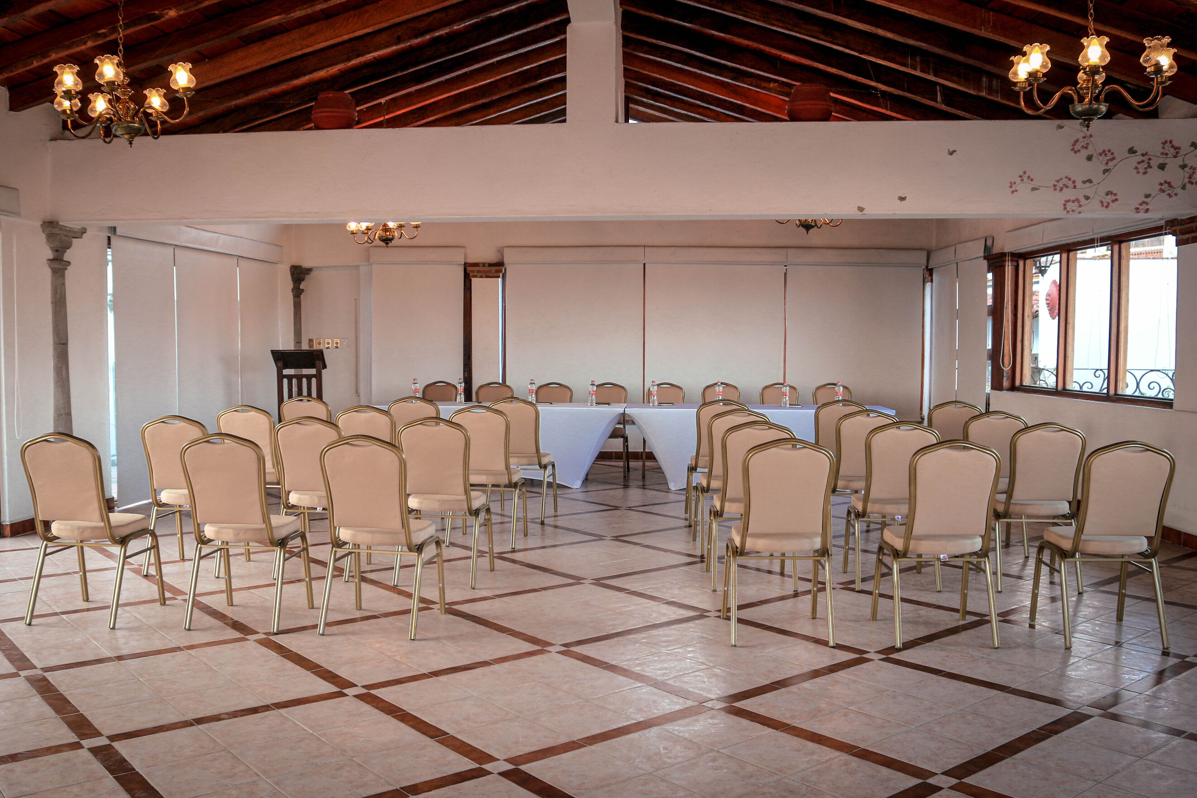 A conference room with a long table and chairs arranged for a meeting.