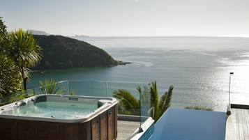 Outdoor pool, an infinity pool, sun loungers