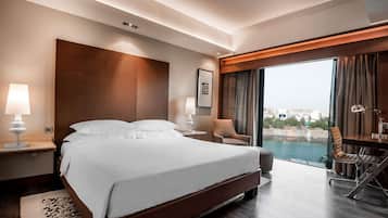 Premium bedding, pillow-top beds, minibar, in-room safe