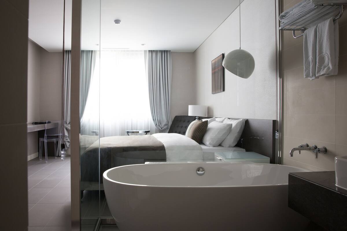 shower, hair dryer, bathrobes, slippers