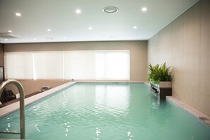 Family Suite (Free laundry and dry for 2+ nights / Pool access with fee, inquire 1 day ahead) | Living area